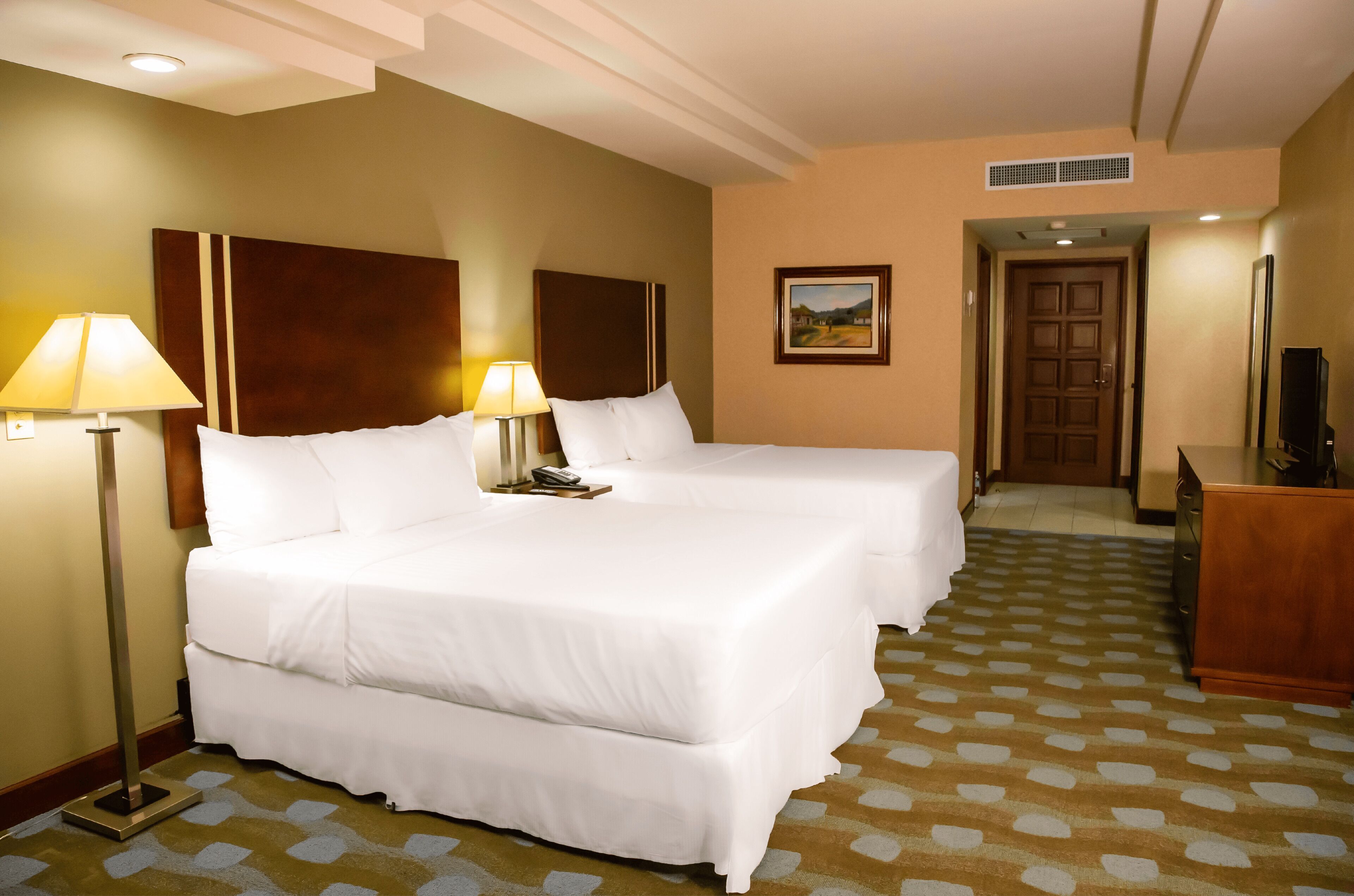 Premium bedding, down duvets, minibar, in-room safe