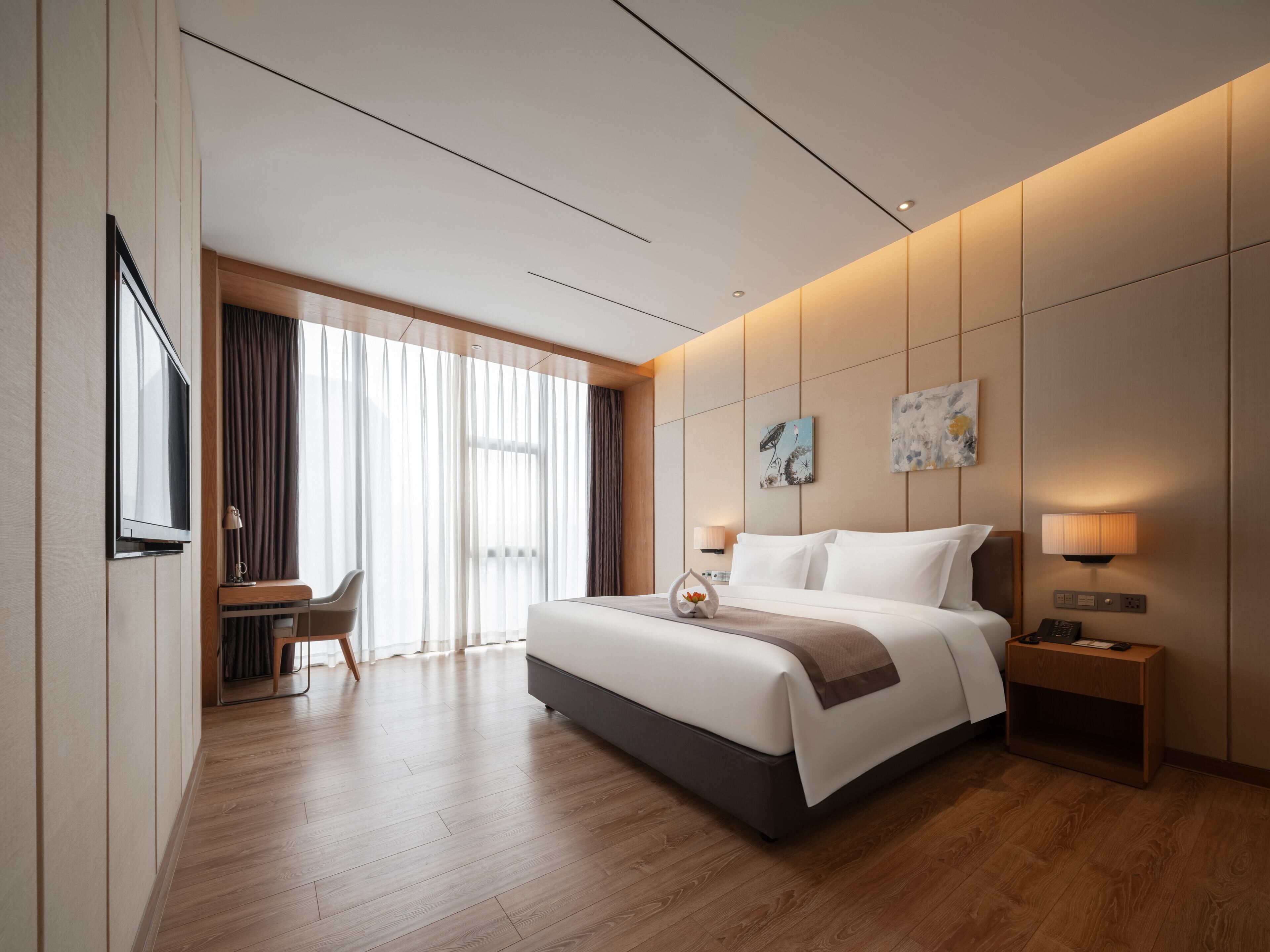 ألحفة محشوة بالريش وخزنة داخل الغرفة وستائر تعتيم ومكواة/لوح كي