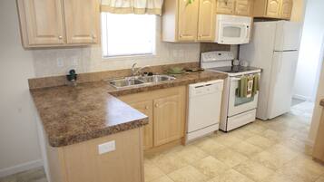 Cottage, Kitchen | Private kitchenette | Full-size fridge, microwave, stovetop, dishwasher