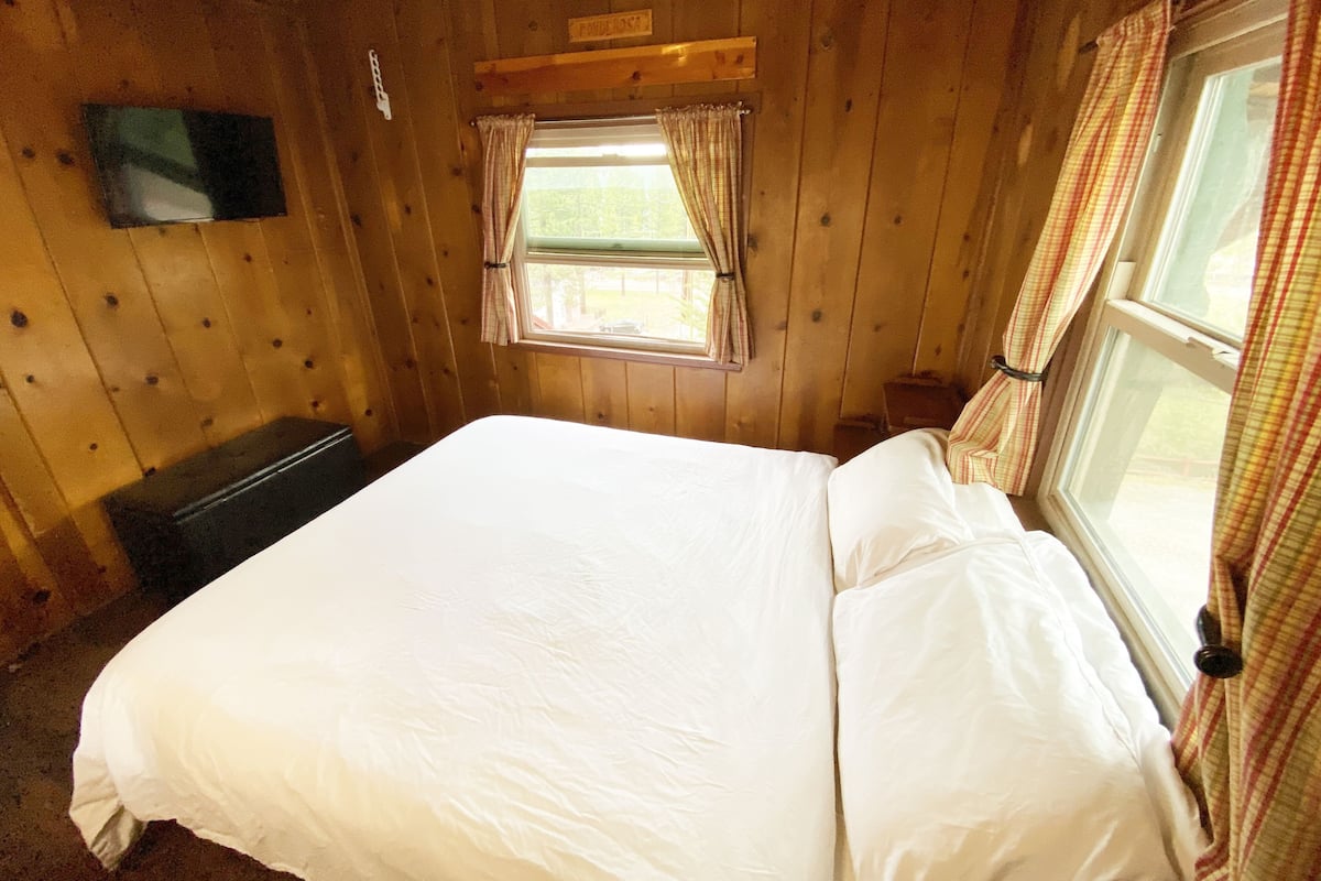 Premium bedding, desk, laptop workspace, soundproofing