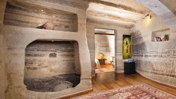 King Cave Suite | Premium bedding, in-room safe, individually decorated