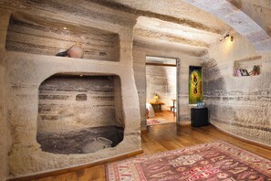 King Cave Suite | Premium bedding, in-room safe, individually decorated