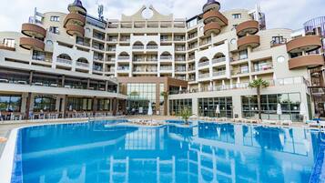 Indoor pool, seasonal outdoor pool, pool umbrellas, sun loungers