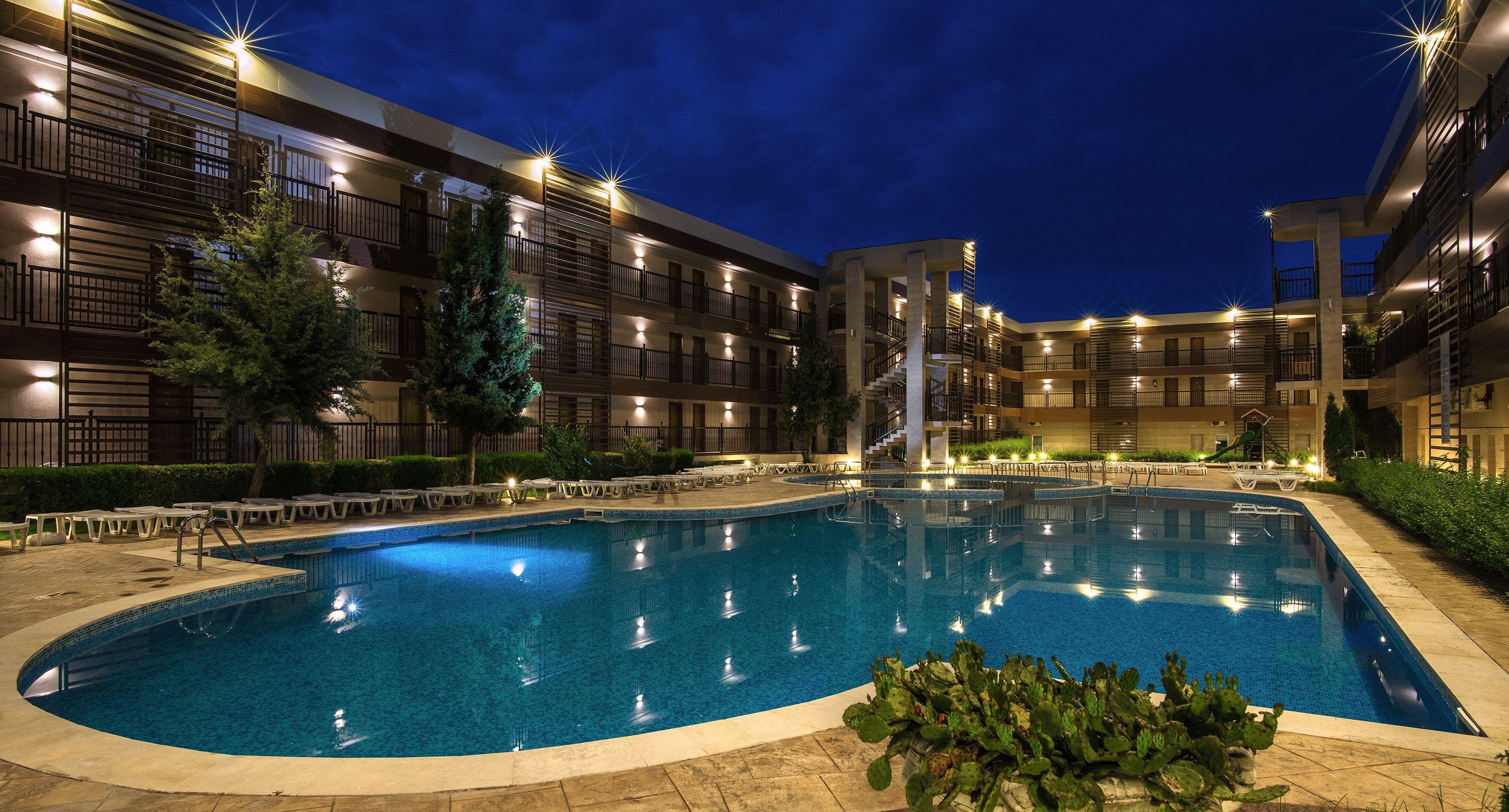 indoor pool, seasonal outdoor pool, pool umbrellas, pool loungers