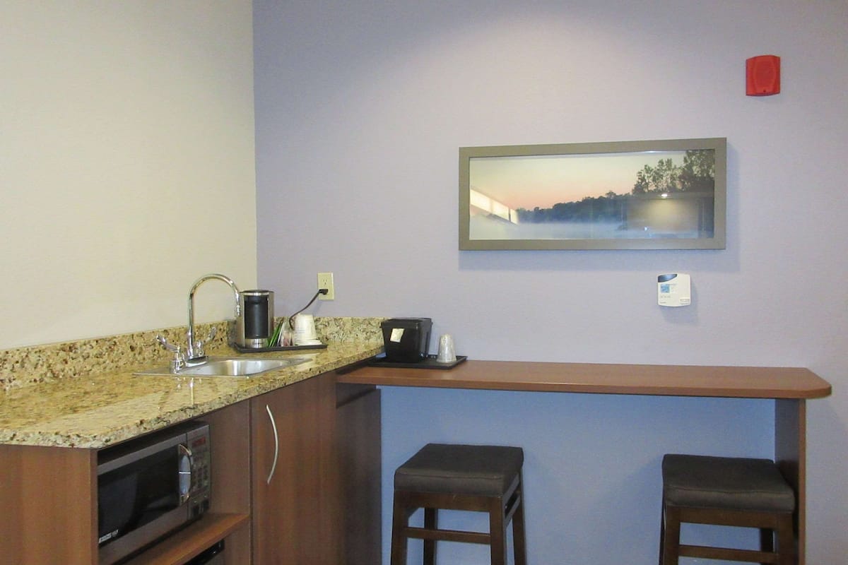 Pillow-top beds, desk, laptop workspace, blackout curtains