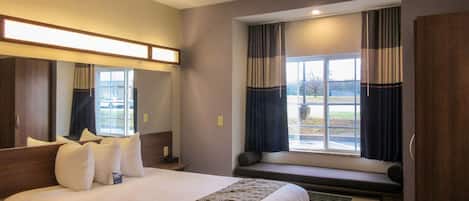 Pillowtop beds, desk, laptop workspace, blackout drapes