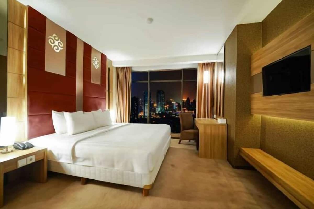 Minibar, coffres-forts dans les chambres, bureau, Wi-Fi gratuit