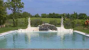Outdoor pool, open 9:00 AM to 7:00 PM, pool umbrellas, sun loungers