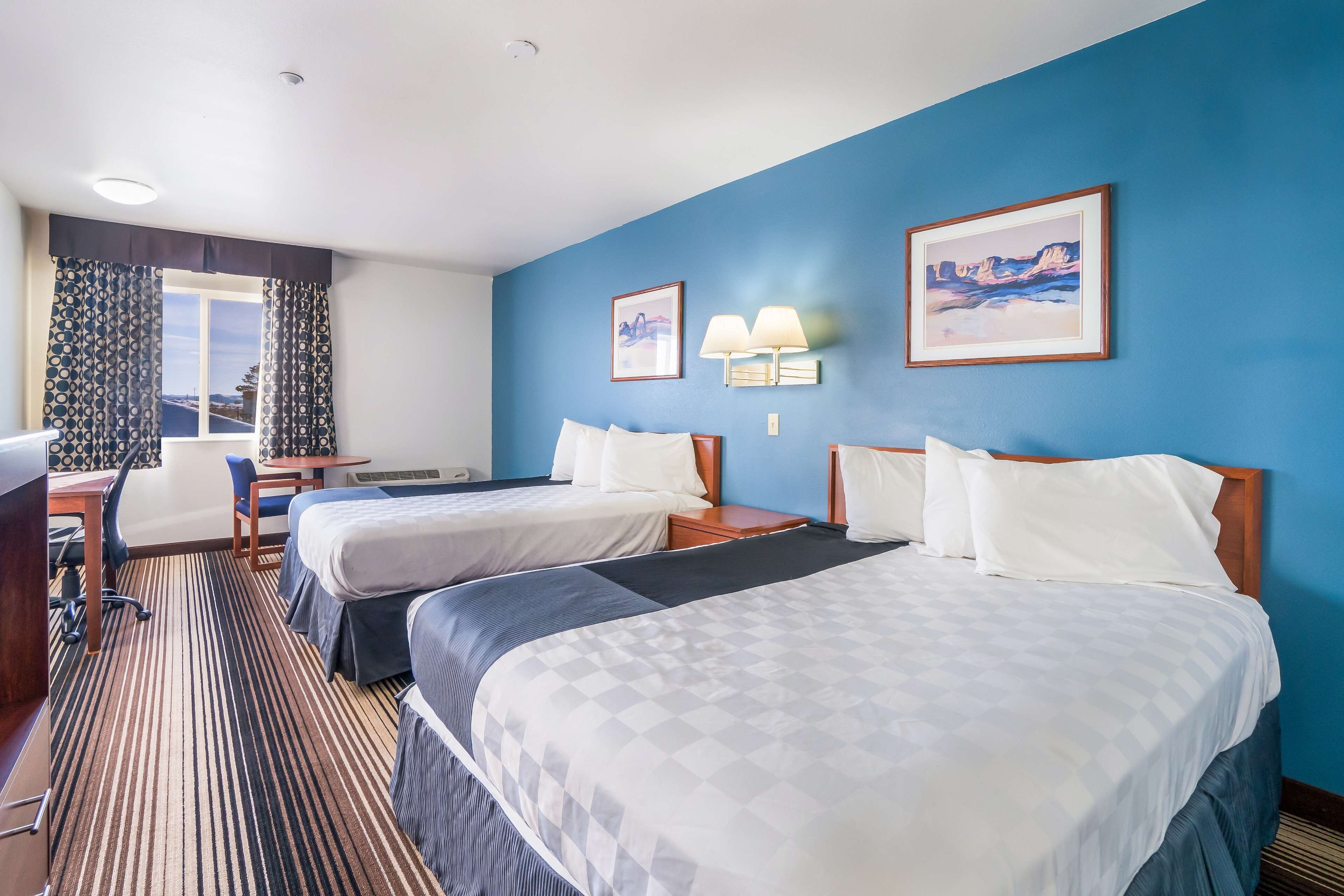 Hypo-allergenic bedding, pillow-top beds, in-room safe, desk