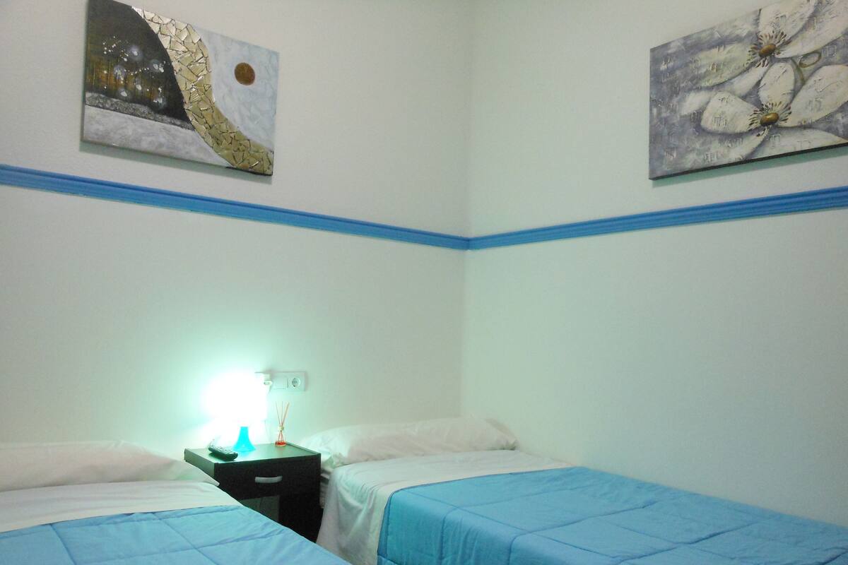 Twin Room, 2 Single Beds, Shared Bathroom (Interior) | Blackout curtains, free WiFi