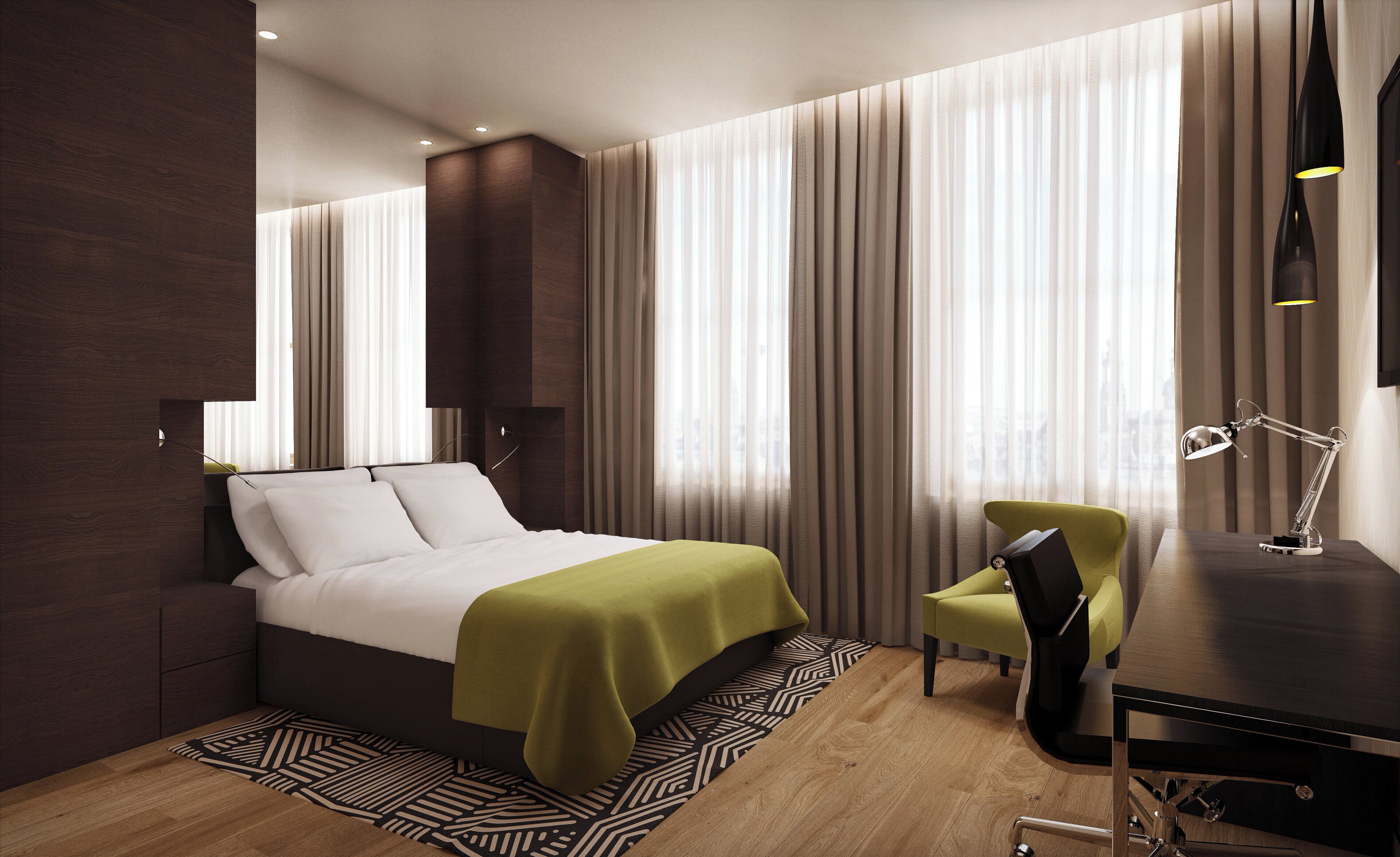 A modern hotel room with a bed, a desk, a chair, and a desk lamp.