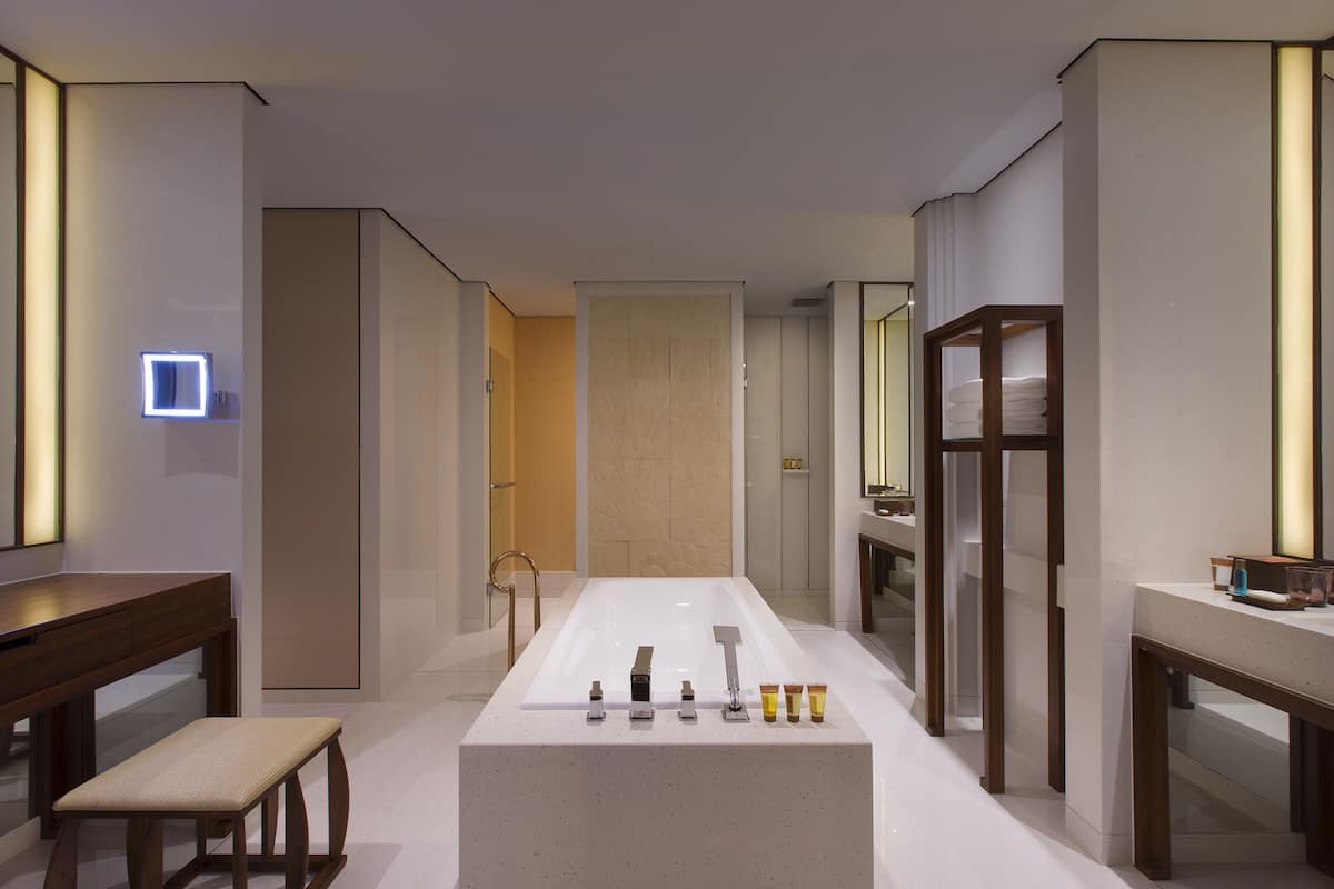 separate bathtub and shower, deep-soaking bathtub, rainfall showerhead