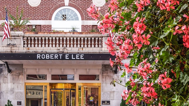A building with a sign reading "ROBERT E LEE" and a brick facade. - The Gin Hotel, an Ascend Collection Hotel (Lexington)
