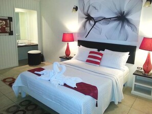 In-room safe, individually decorated, desk, iron/ironing board - Green Palm Boutique Hotel (Crown Point)