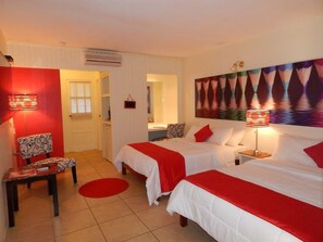 Studio, 2 Double Beds | In-room safe, individually decorated, desk, iron/ironing board - Green Palm Boutique Hotel (Crown Point)