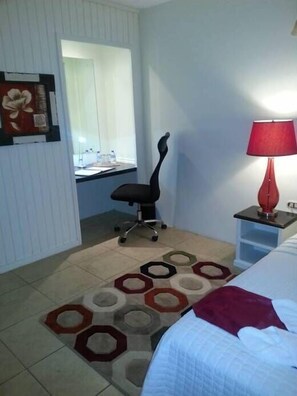 Standard Room, 1 Queen Bed | Living area | Flat-screen TV - Green Palm Boutique Hotel (Crown Point)