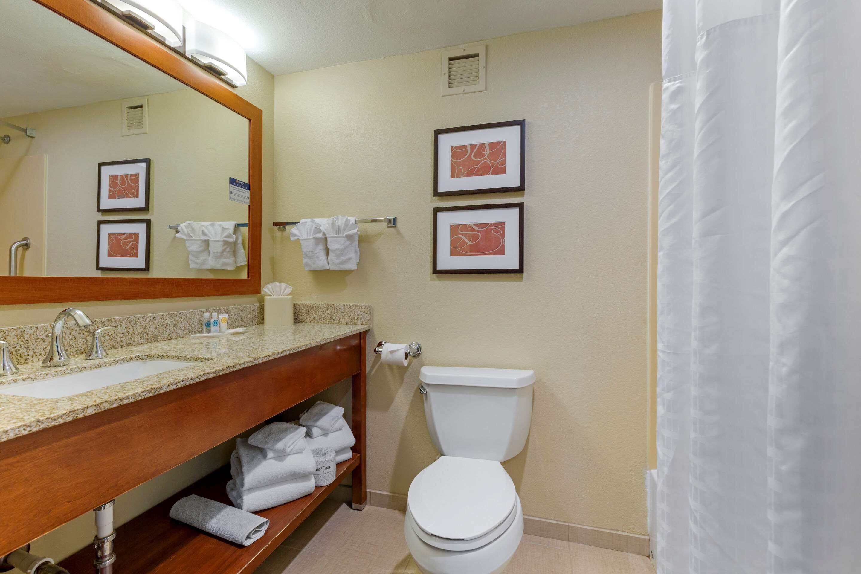 suite, multiple beds, non smoking | bathroom | combined shower/bathtub, designer toiletries, hair dryer, towels