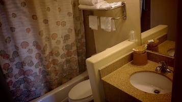Combined shower/tub, hair dryer, towels, soap