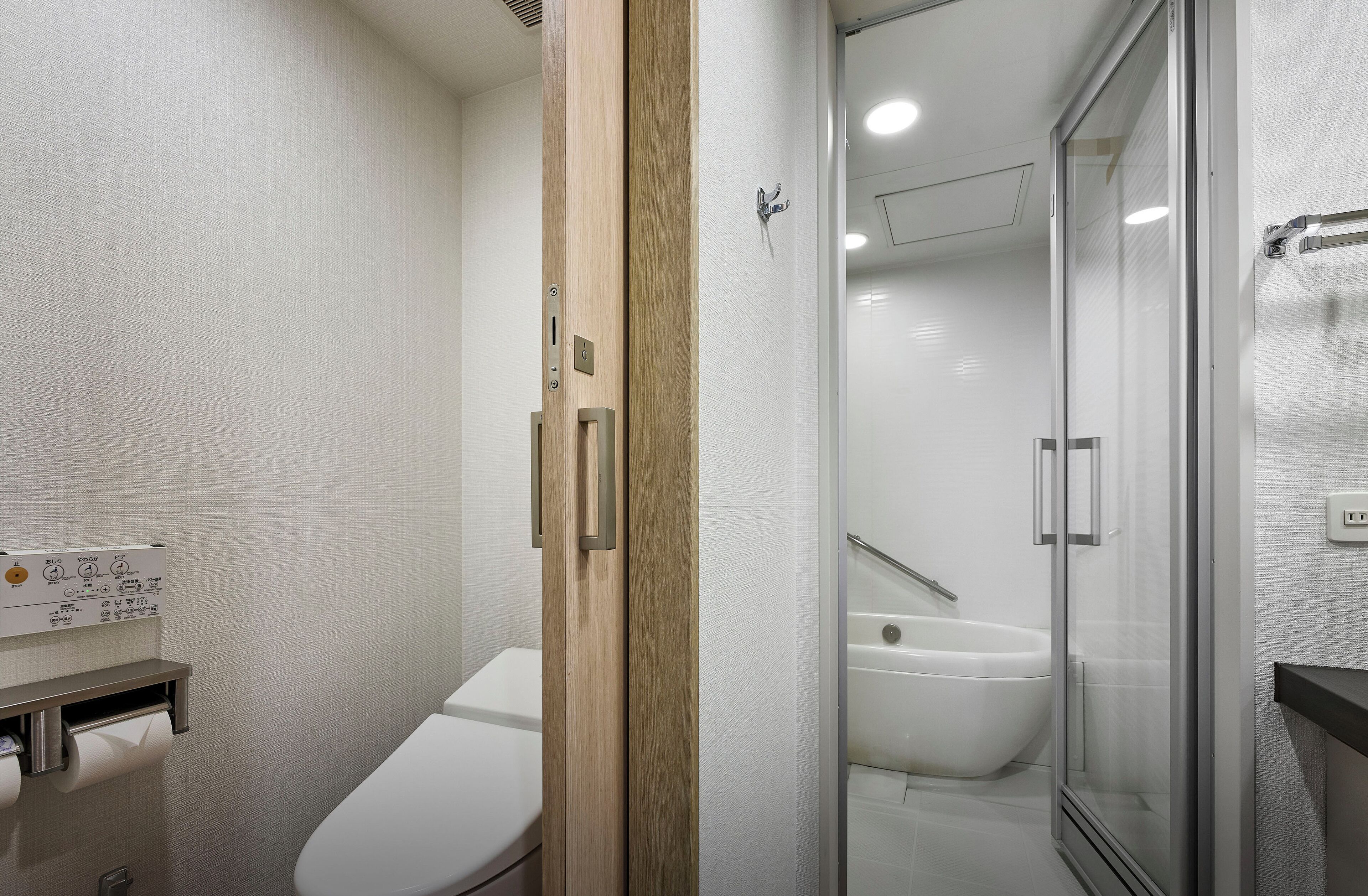 combined shower/bathtub, free toiletries, hair dryer, slippers