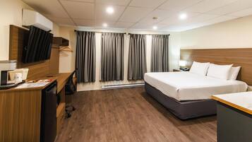 Standard Room, 1 King Bed, Accessible, Kitchenette (with Single Sofabed) | Hypo-allergenic bedding, desk, laptop workspace, blackout curtains