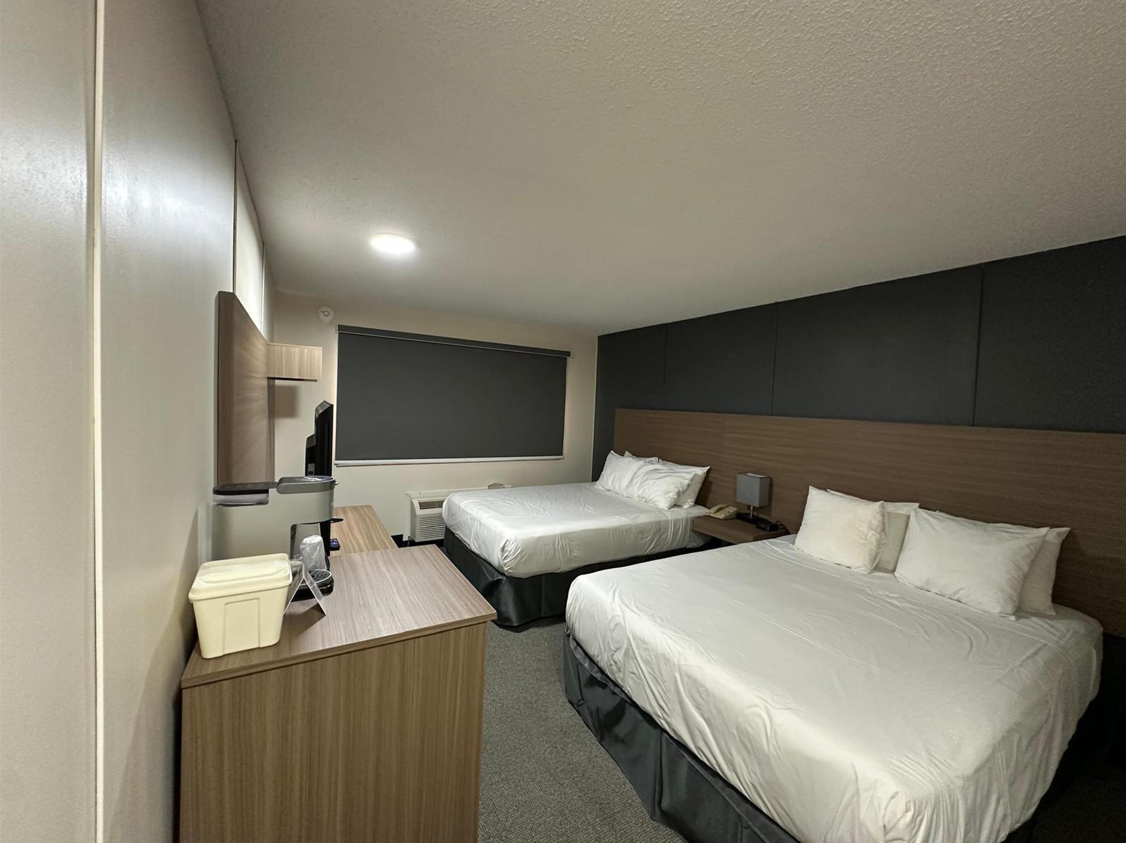 Standard Room, 2 Queen Beds, Non Smoking, Refrigerator & Microwave | Hypo-allergenic bedding, desk, laptop workspace, blackout drapes