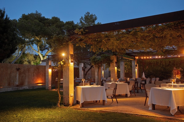 Lunch, dinner served; Mediterranean cuisine, garden views