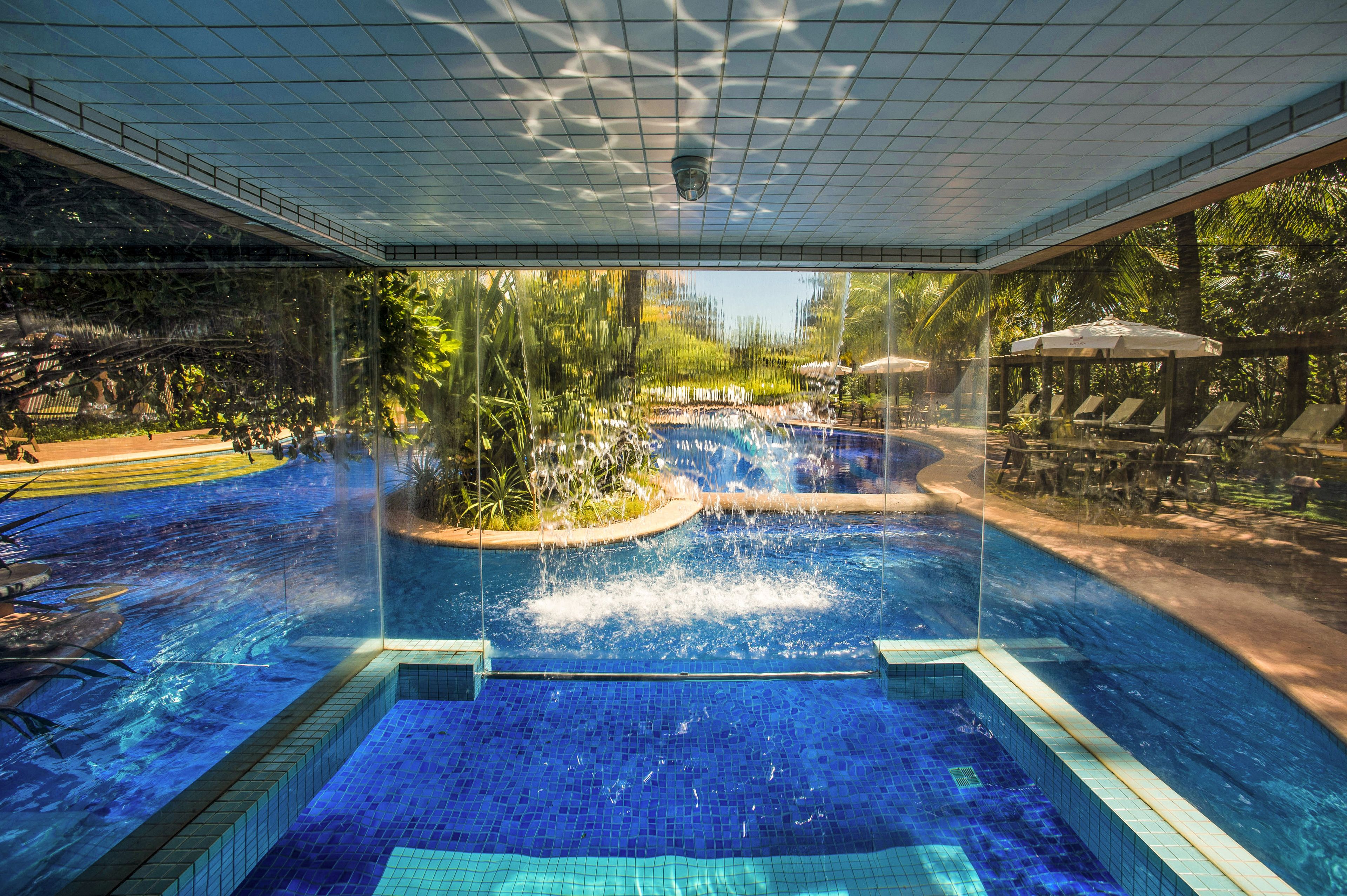 Outdoor pool, open 8:00 AM to 10:00 PM, pool umbrellas, pool loungers