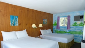 A hotel room with two beds, wooden paneling, a mural, and a window with curtains. - Algonquin Motel (Machar)