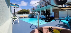 Outdoor pool, open 10:00 AM to 8:00 PM, pool umbrellas, pool loungers - Pismo Beachwalker Inn & Suites (Pismo Beach)