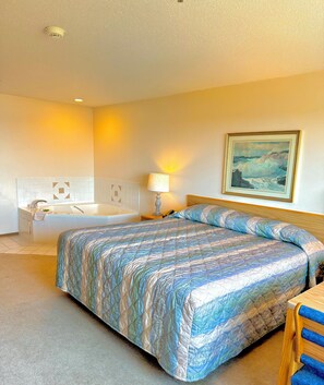 客房, 1 张特大床, 按摩浴缸 | 办公桌、遮光窗帘、床单