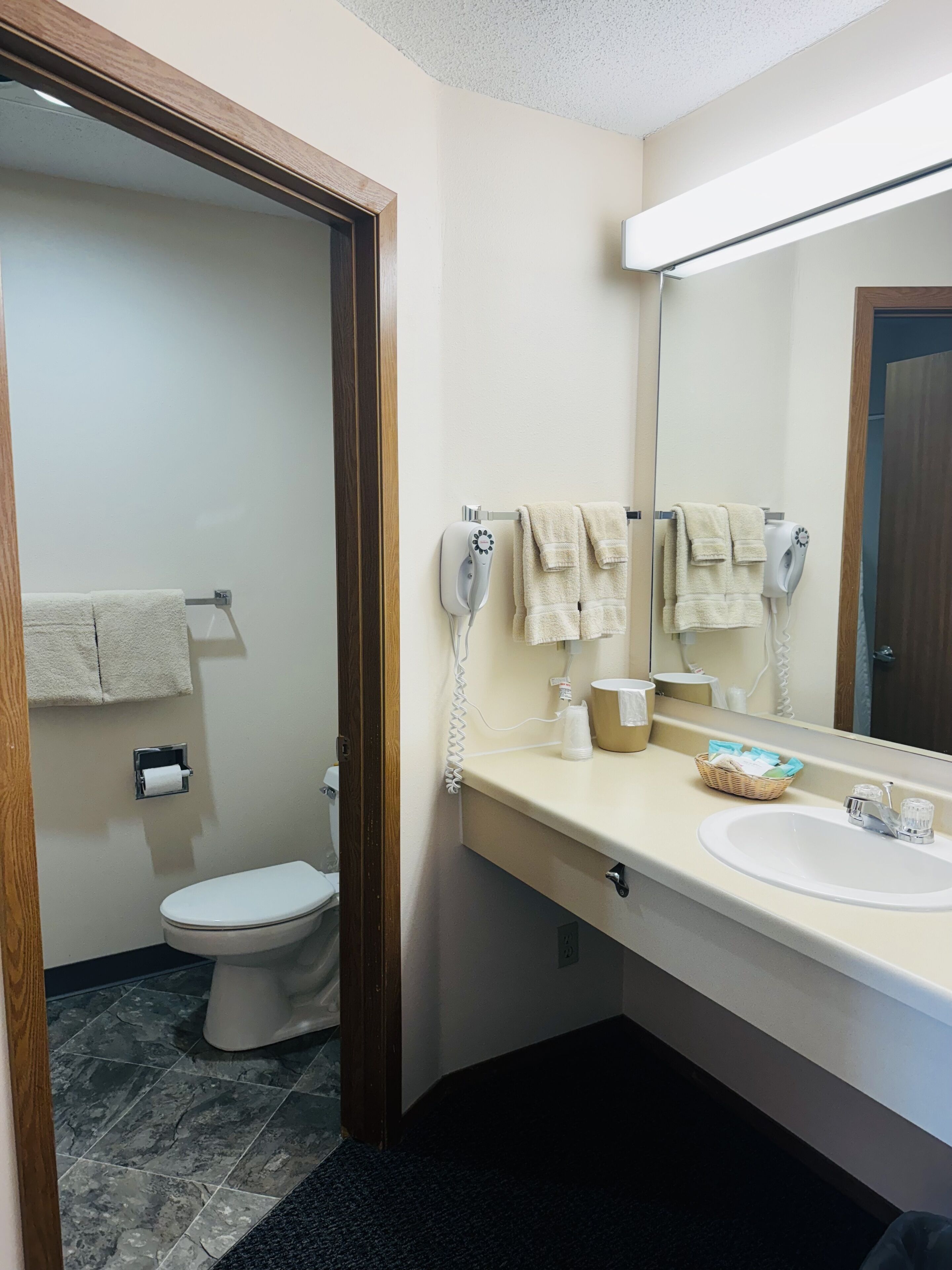 standard room, 2 queen beds | bathroom | free toiletries, hair dryer, towels
