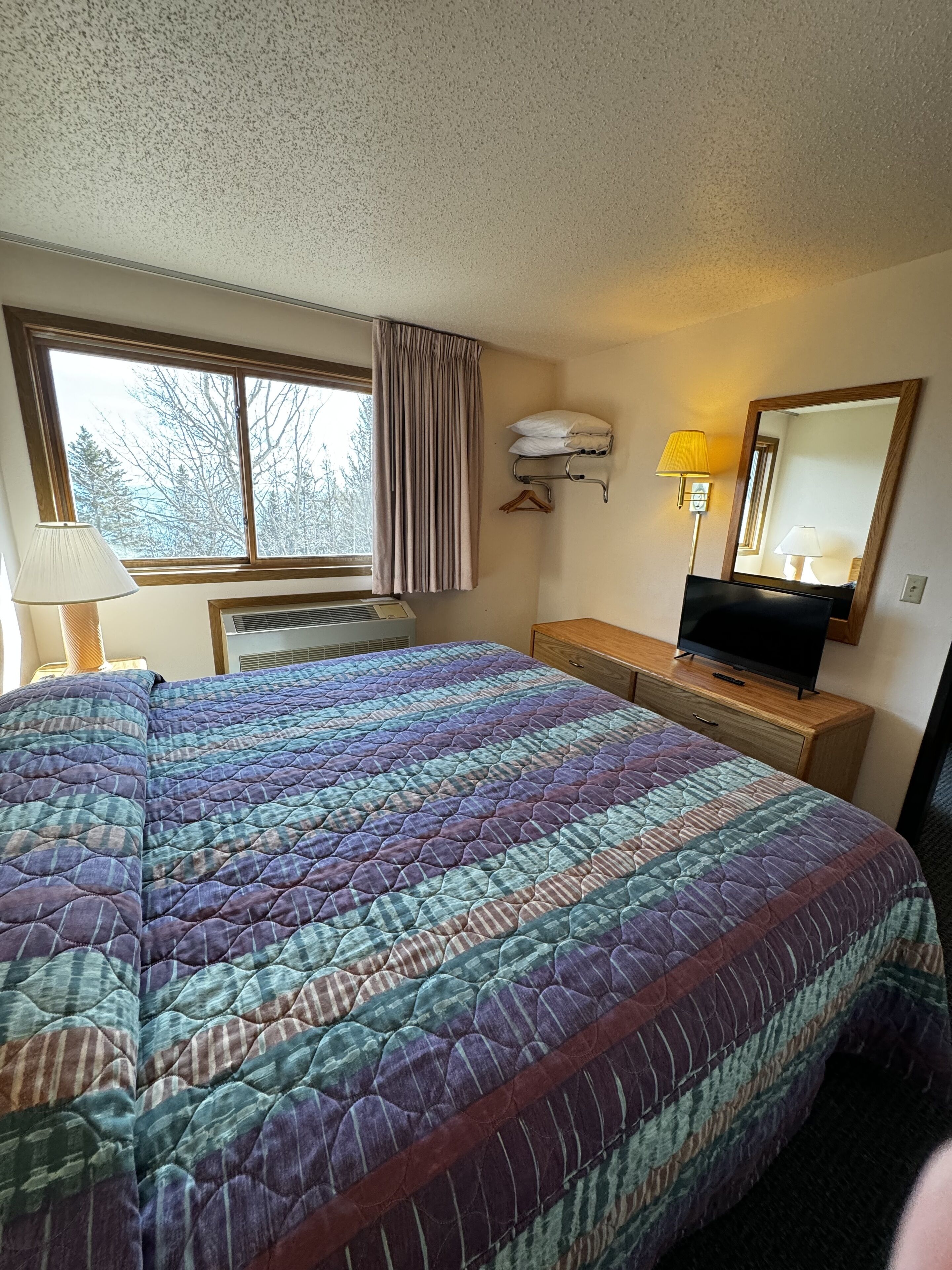 family room, multiple beds | desk, blackout curtains, bed sheets