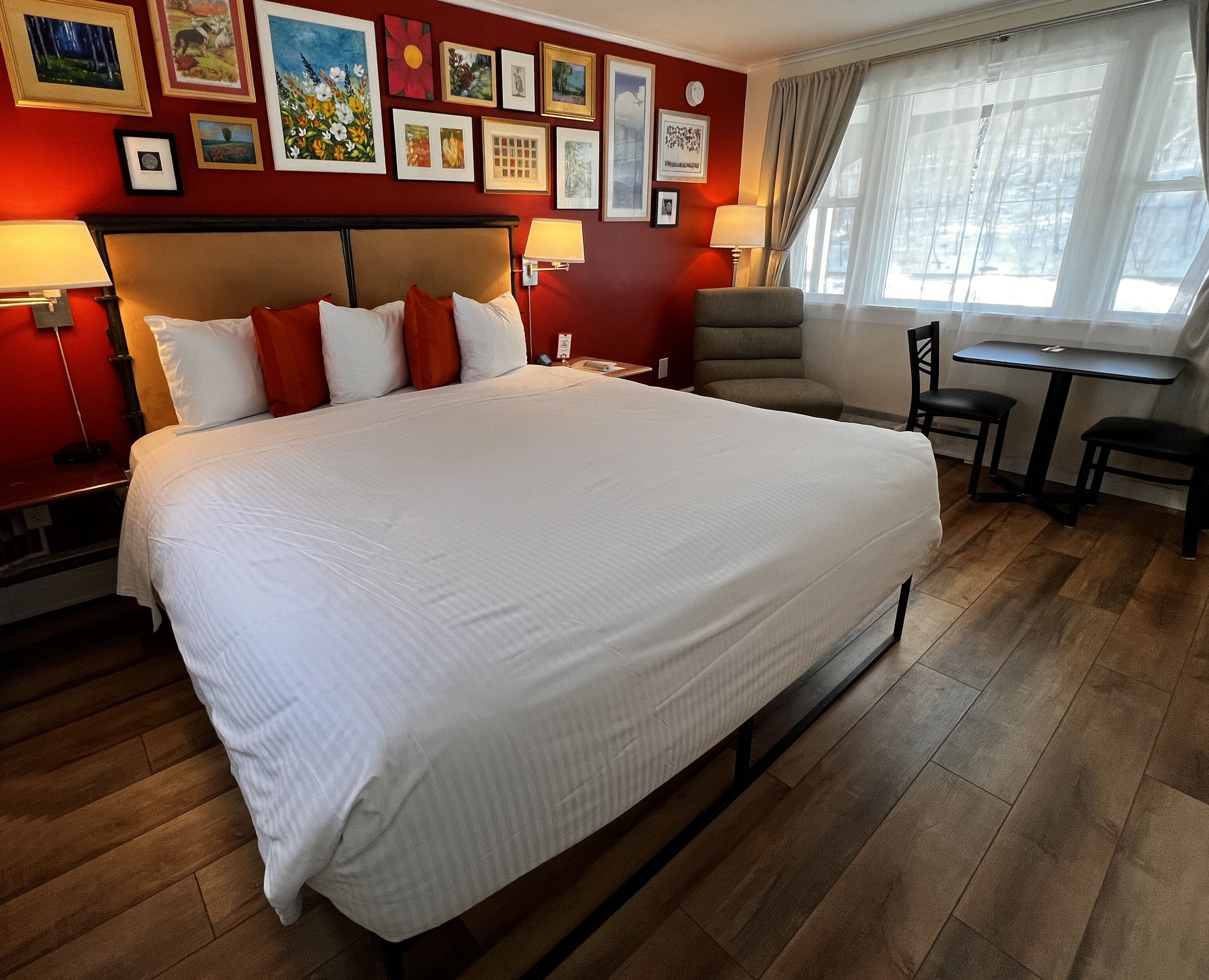 Individually decorated, desk, blackout drapes, iron/ironing board