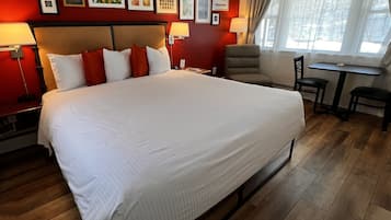 Individually decorated, desk, blackout drapes, iron/ironing board