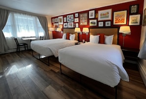 Individually decorated, desk, blackout drapes, iron/ironing board