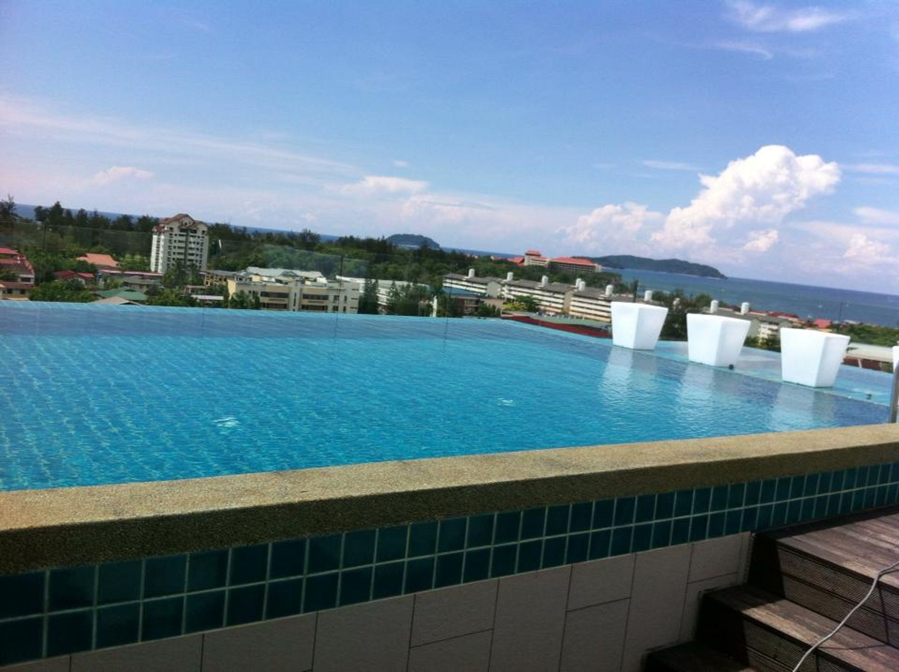 outdoor pool, open 8:30 am to 6:30 pm, pool loungers