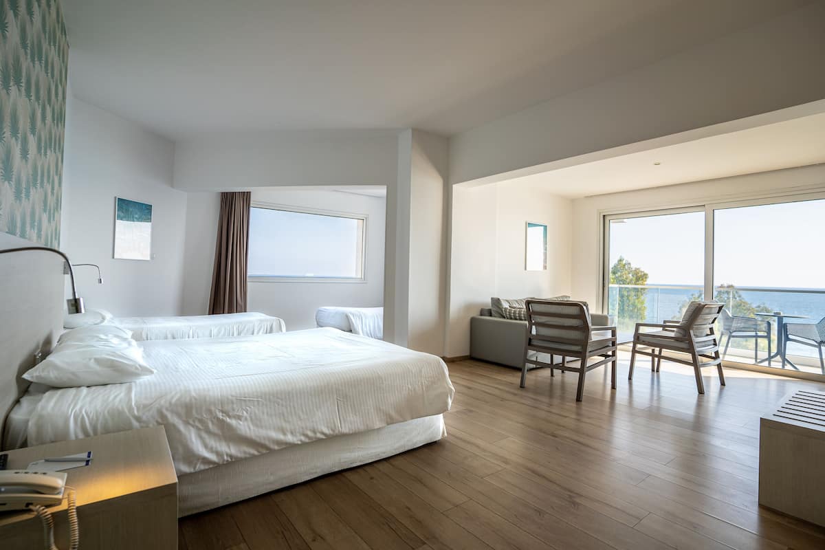 Suite, Sea View Room | In-room safe, desk, soundproofing, iron/ironing board