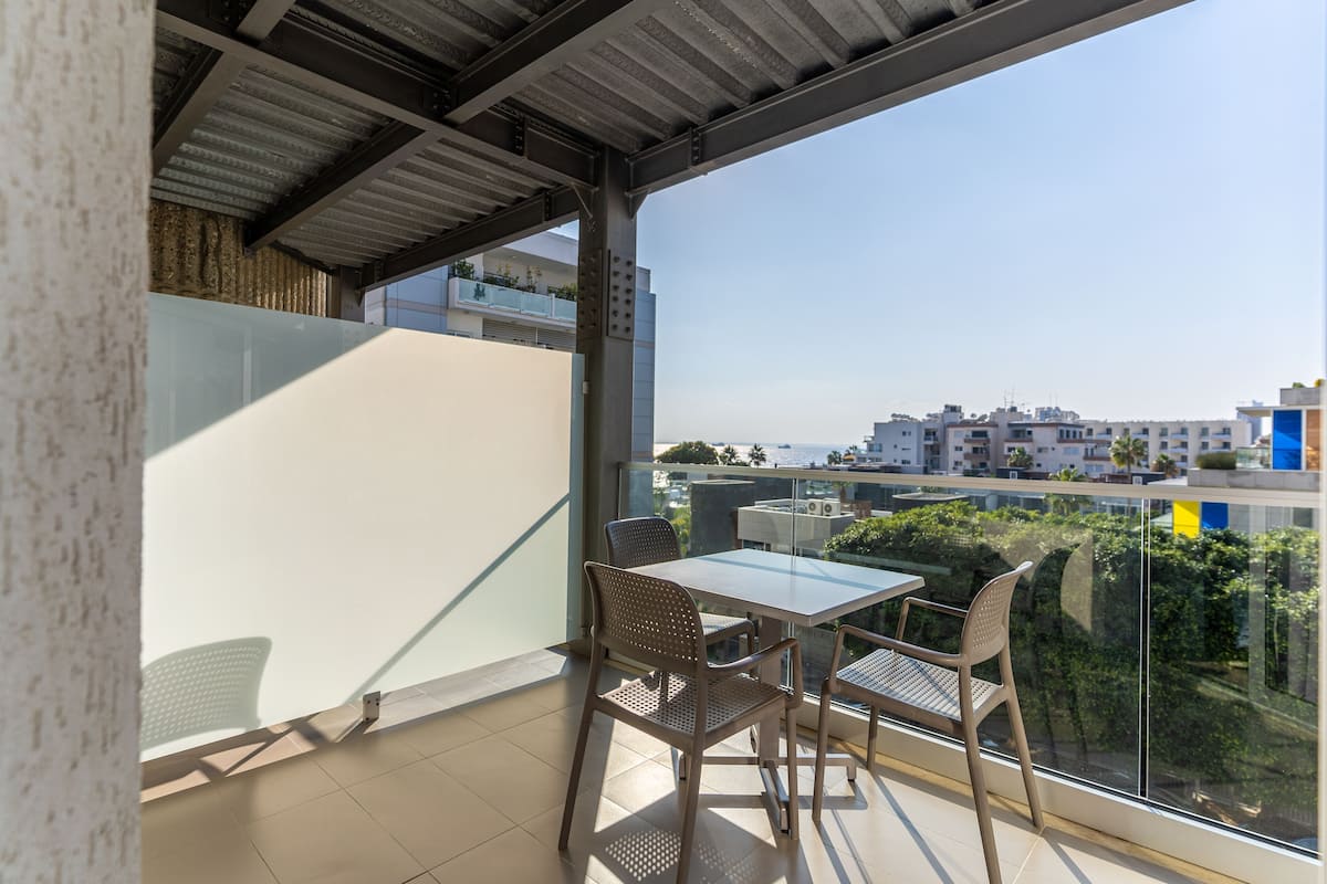 Double or Twin Room, Partial Sea View | In-room safe, desk, soundproofing, iron/ironing board