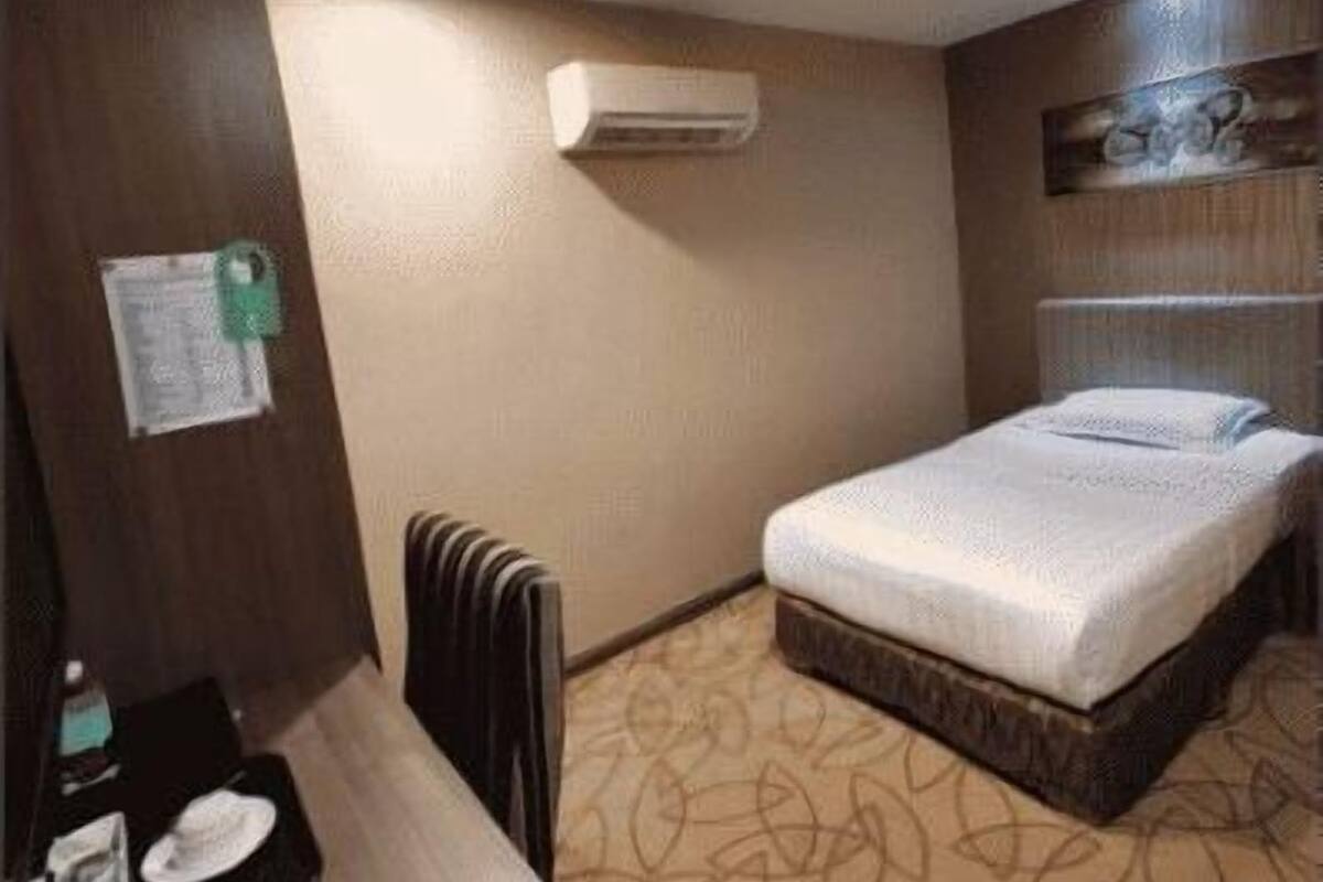 Minibar, coffres-forts dans les chambres, fer et planche à repasser
