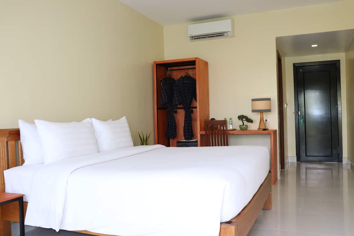 Ropa de cama de alta calidad y minibar