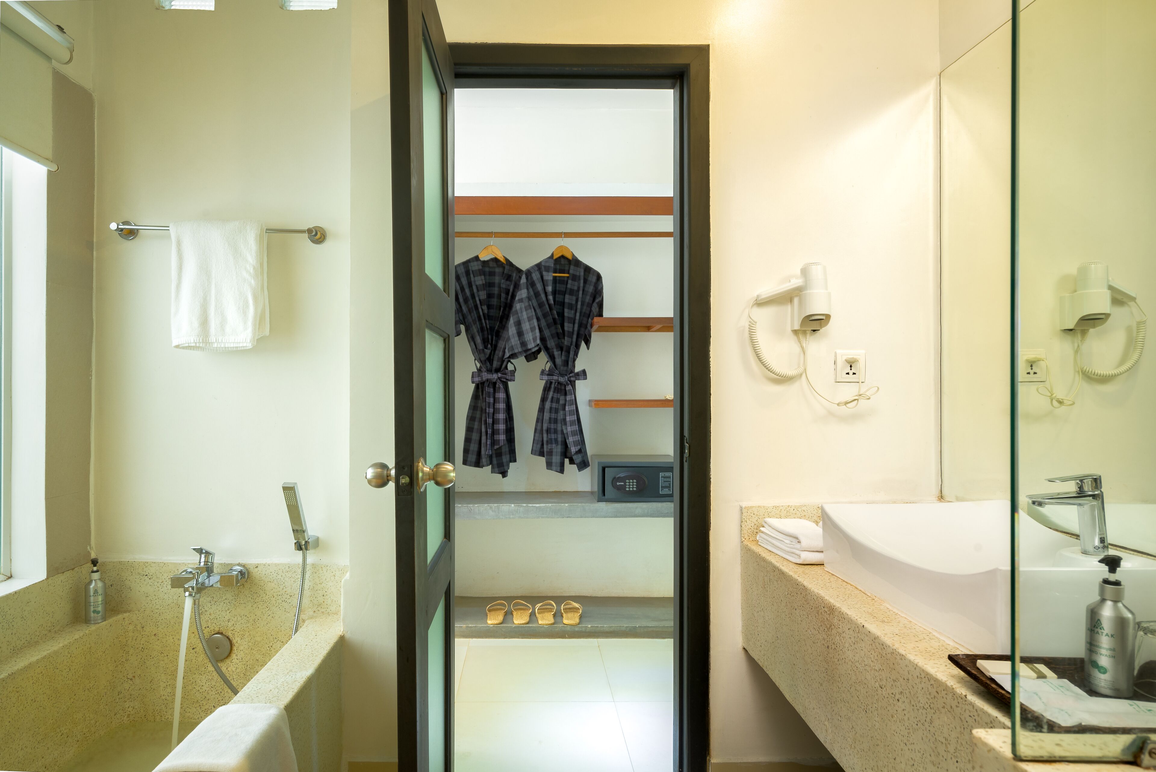 double twin room, pool view | bathroom | free toiletries, hair dryer, bathrobes, slippers
