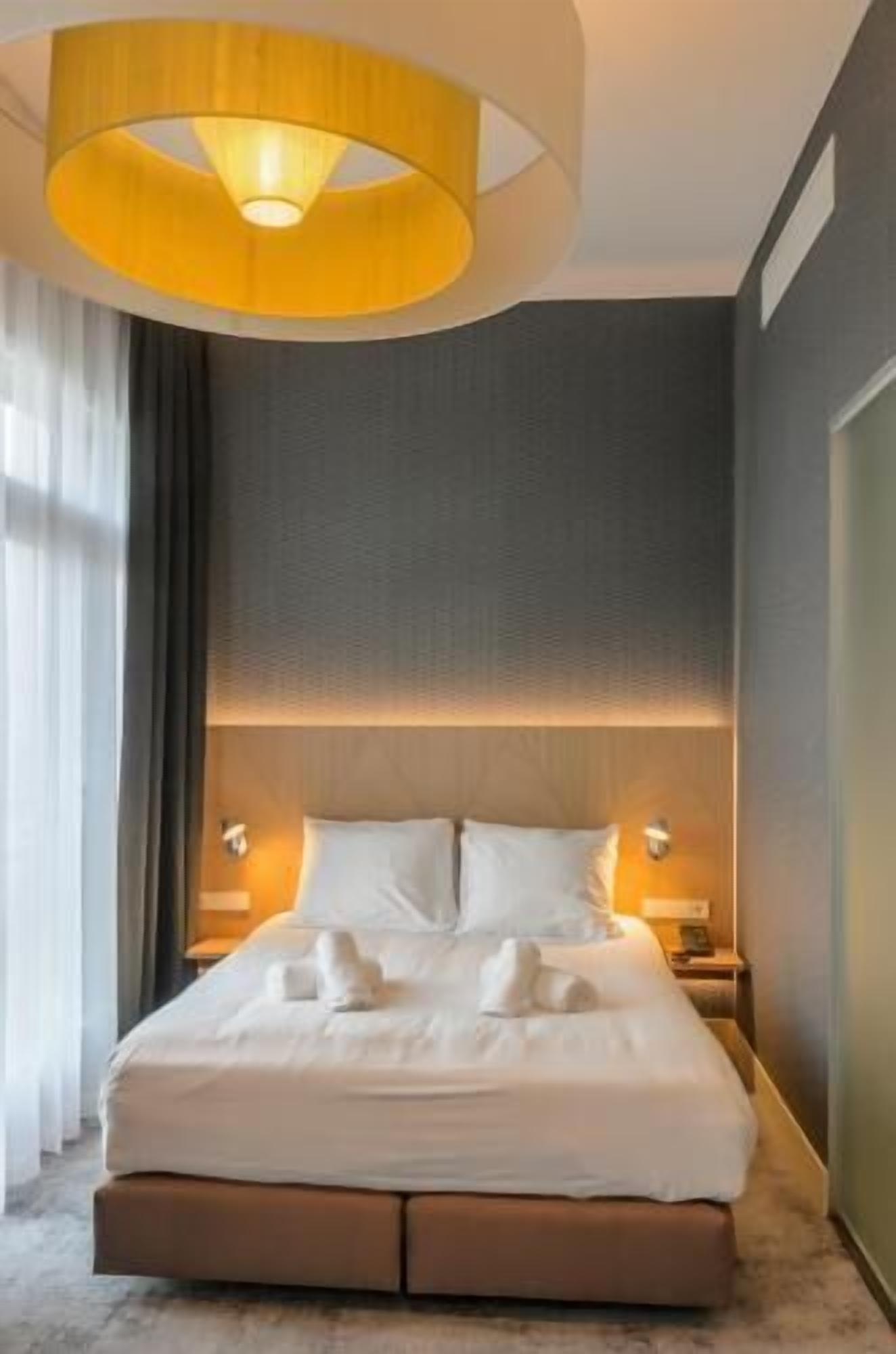 Hypo-allergenic bedding, free minibar, in-room safe, desk