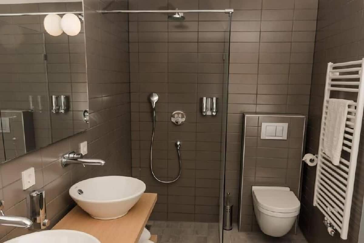 Bathroom | Shower, free toiletries, hair dryer, bathrobes