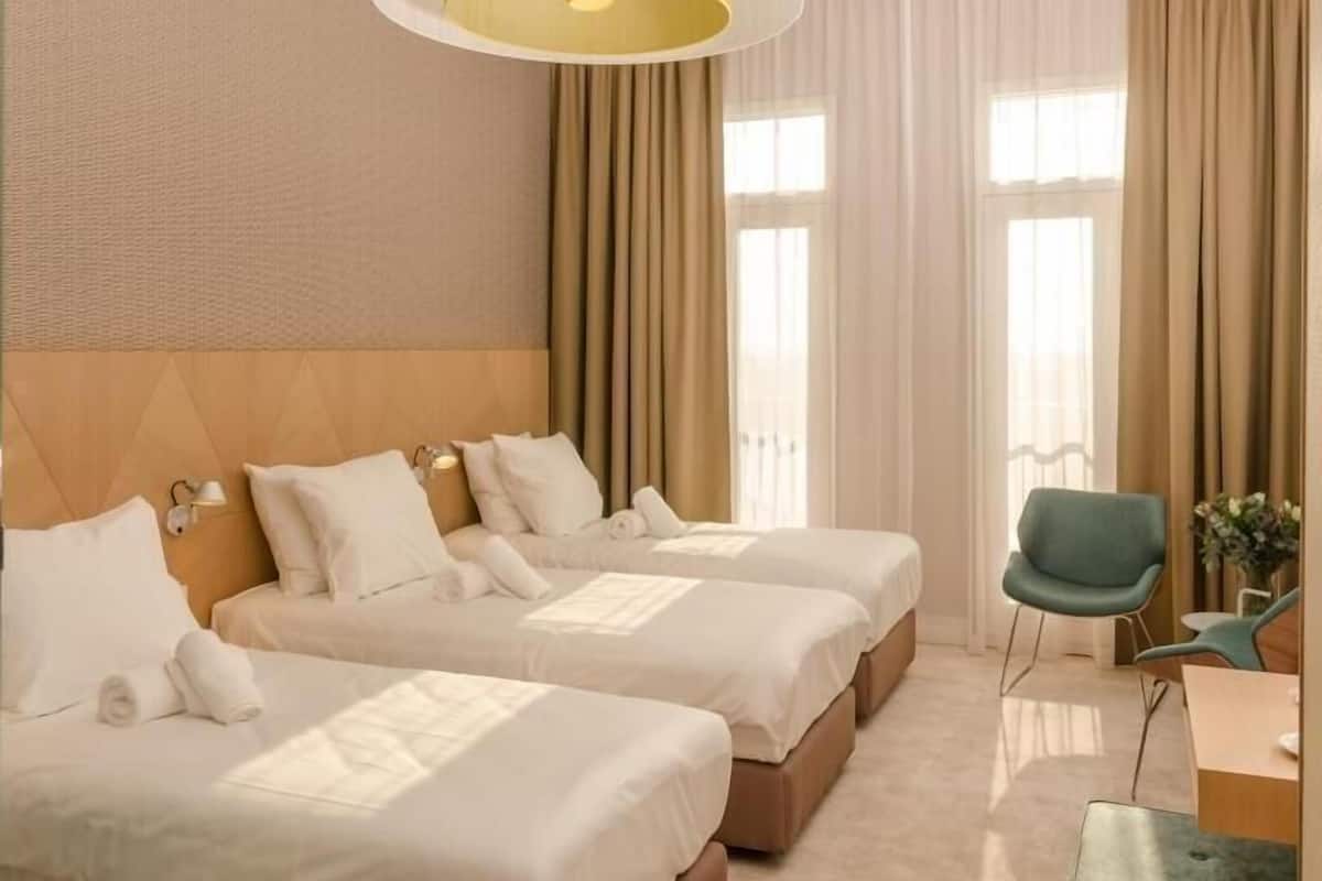 Hypo-allergenic bedding, free minibar, in-room safe, desk