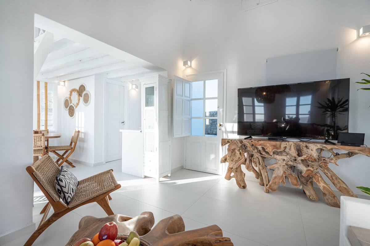 swinging sunset: 3 bedroom villa sunset & sea view with private infinity pool & hot tub | television