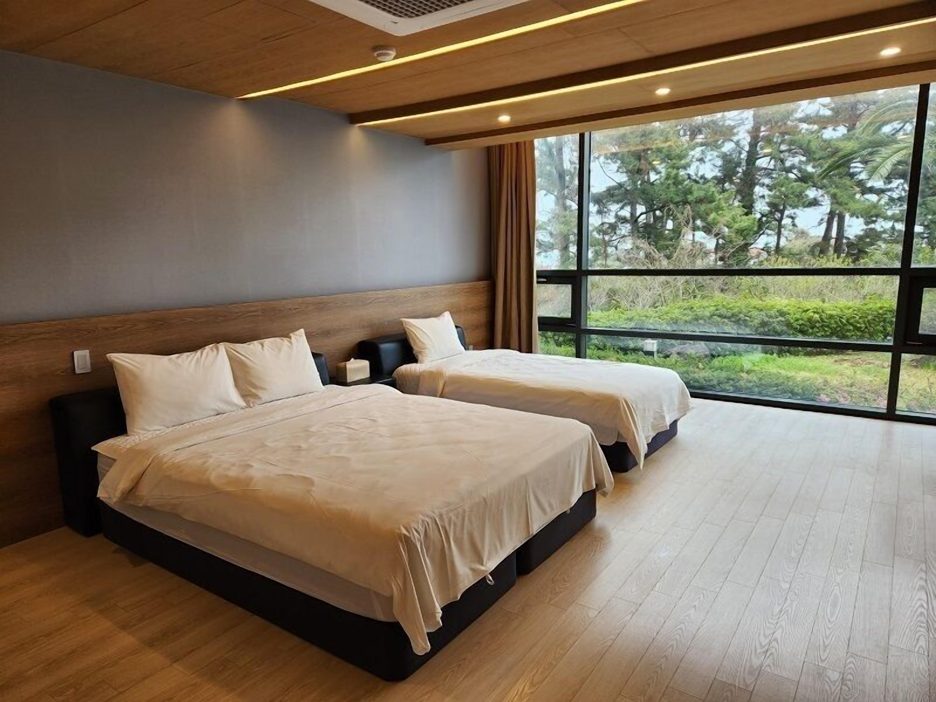 Habitació familiar | Roba de llit d'alta qualitat i decoració individual 