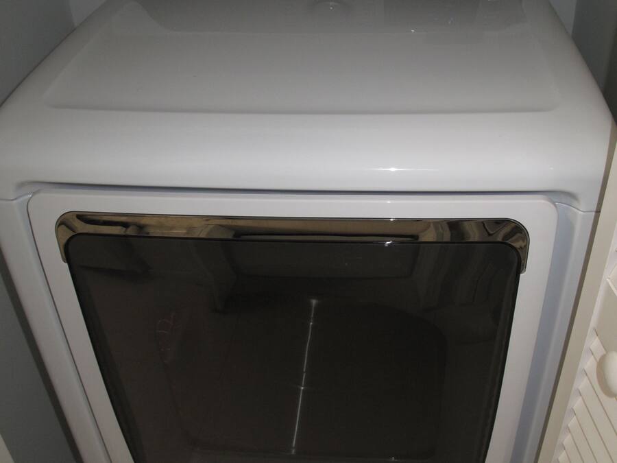 A front view of a Samsung steam smart core washing machine.