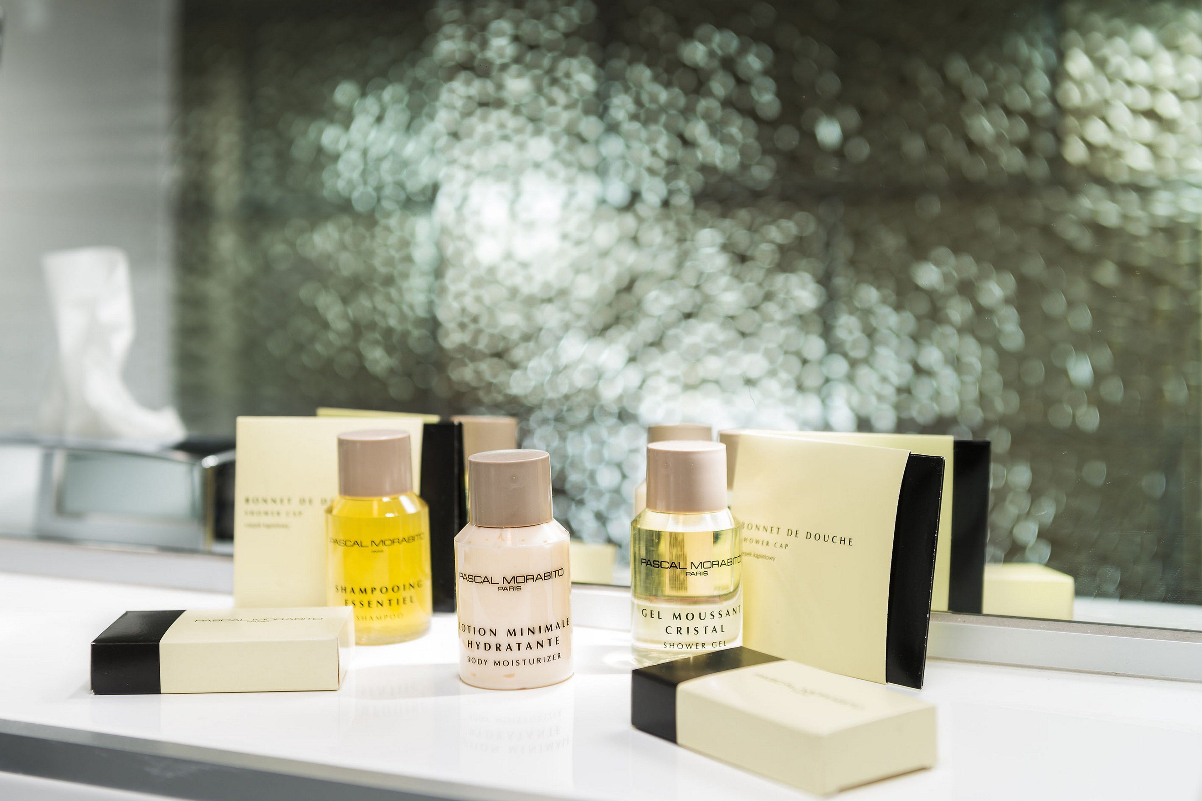 eco-friendly toiletries, hair dryer, towels