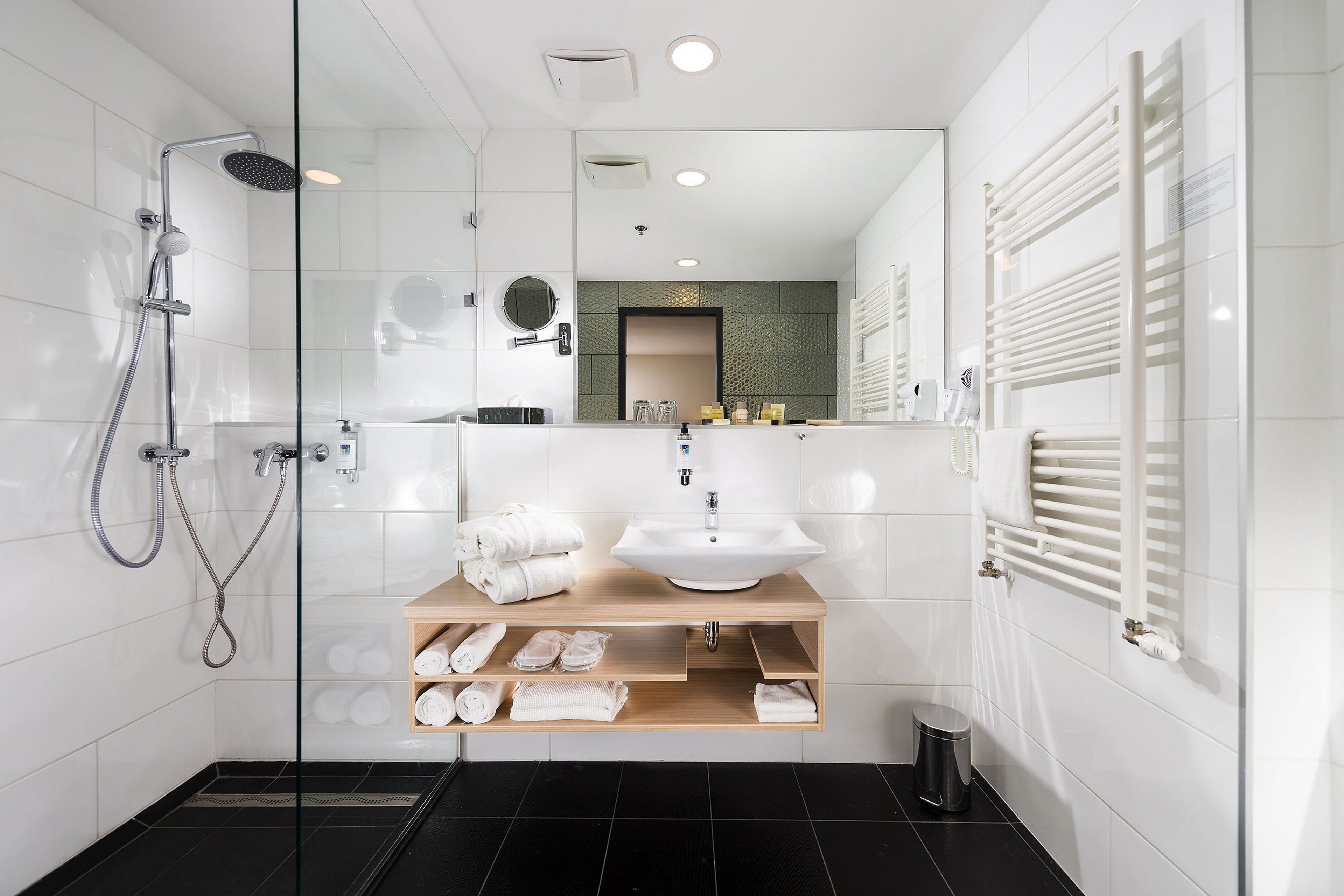 eco-friendly toiletries, hair dryer, towels