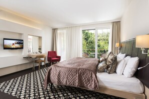 Deluxe Suite | Allergitestet sengetøy, safe på rommet og individuelt dekorert